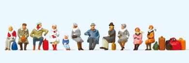 Sitzende Reisende, winterlich 