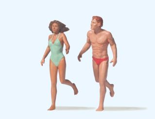 Laufendes Paar am Strand 