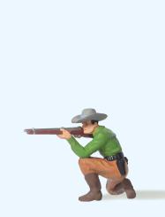 Cowboy kniend, mit Gewehr 
