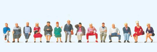 Sitzende Reisende. 14 Figuren 