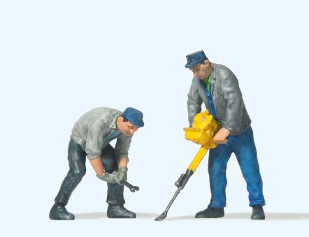 2 Gleisbauarbeiter mit Gleißt 